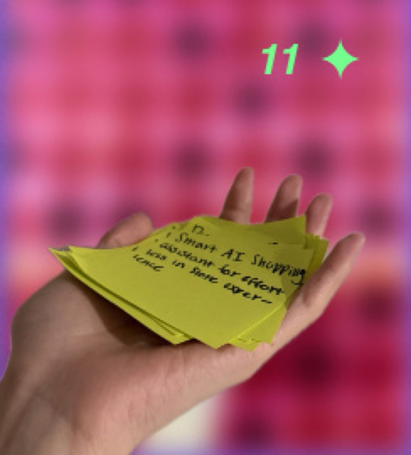 A hand holding the final green insight cards