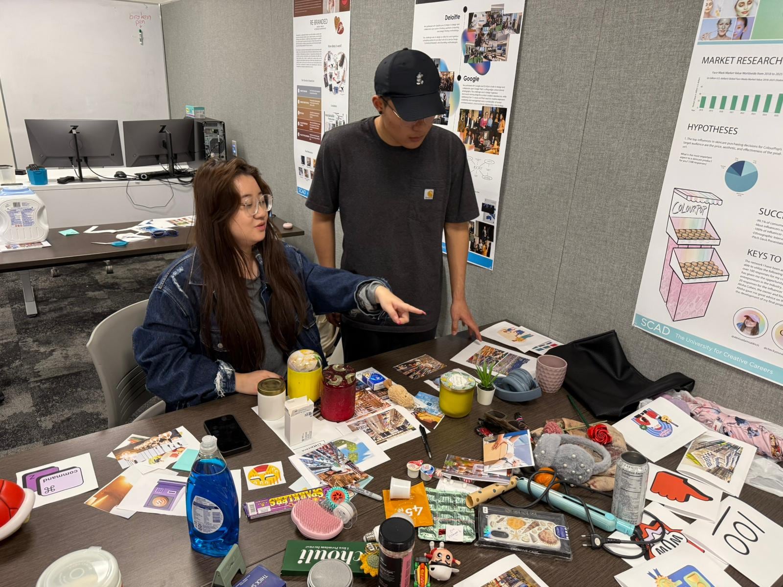 A participant discussing selected cue material with a research team member