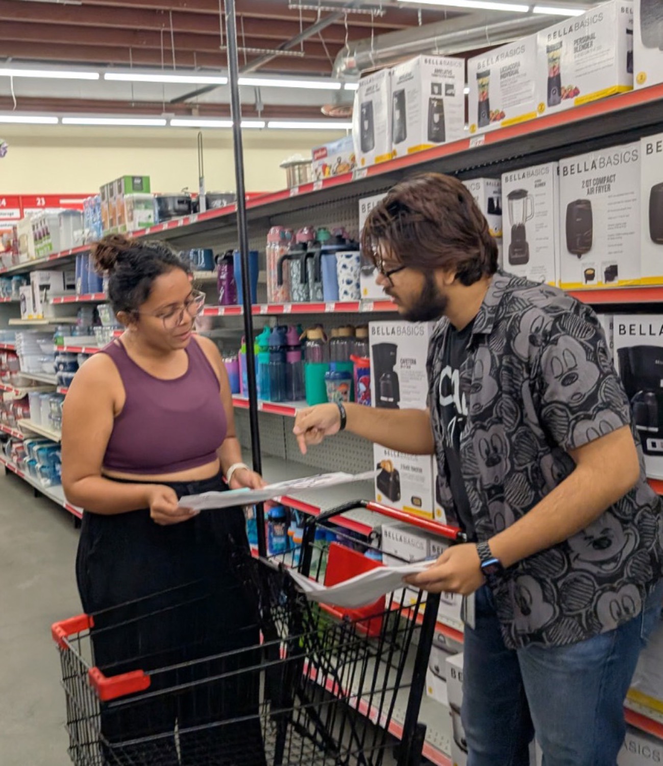 Researchers observing shopper behaviour inside a retail store